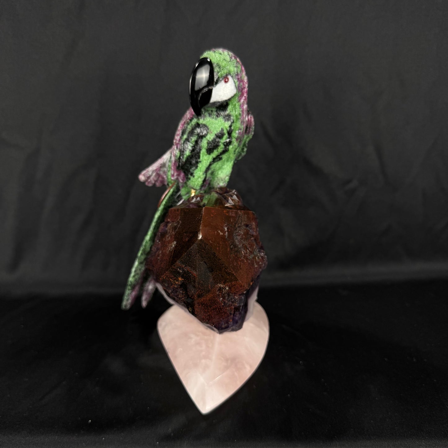 The Rubyzoisite Macaw
