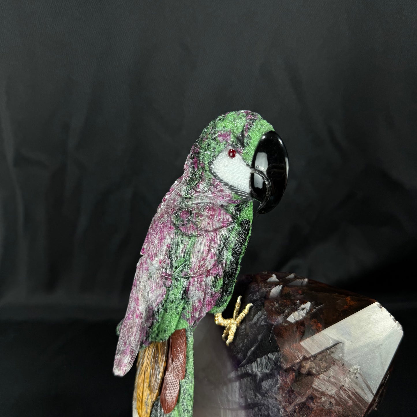 The Rubyzoisite Macaw